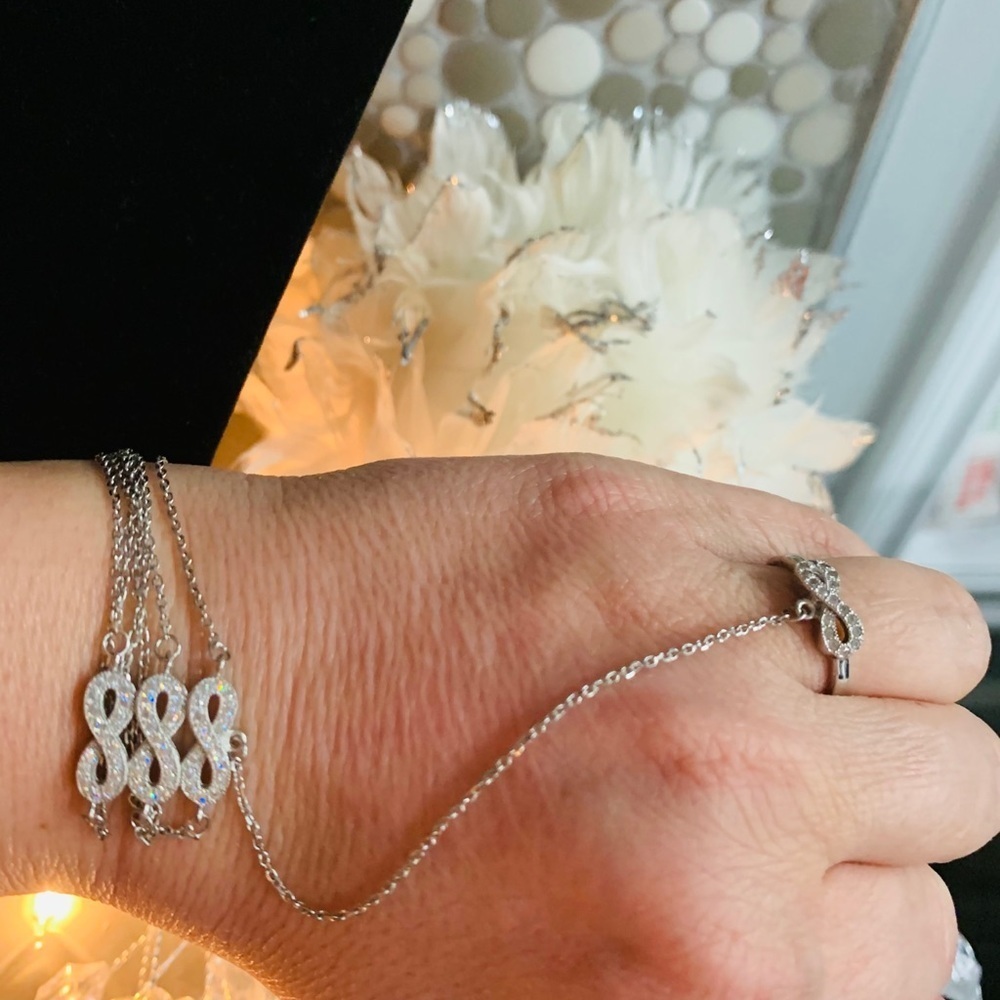 BR10- Sterling Silver 3 infinity bracelet with ring
